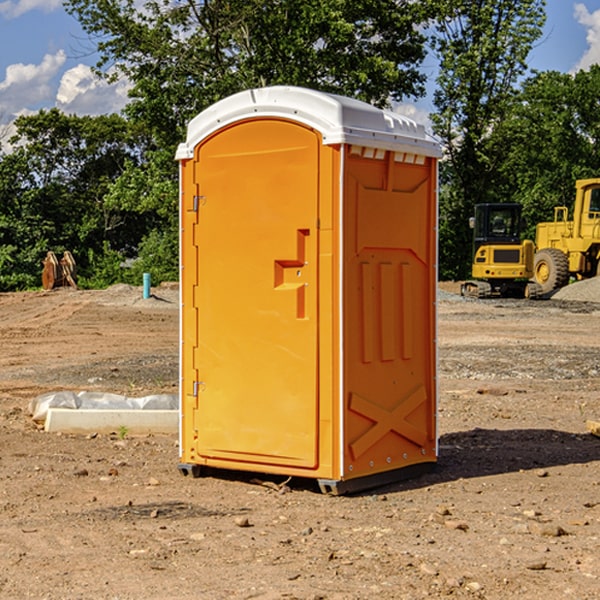 what is the cost difference between standard and deluxe porta potty rentals in East Dunseith